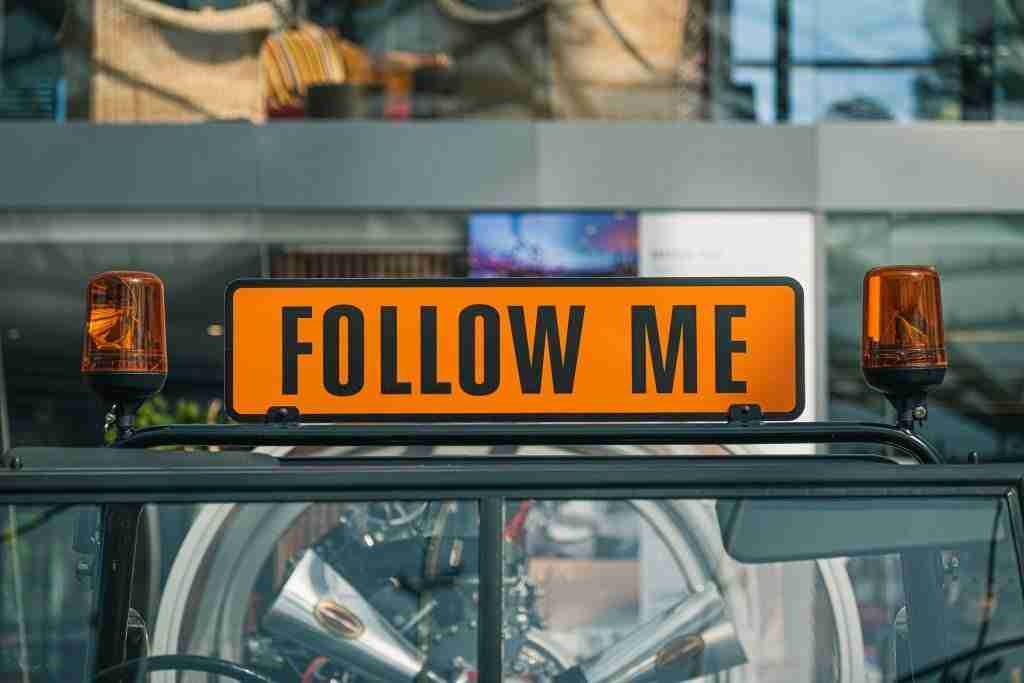 Follow me sign