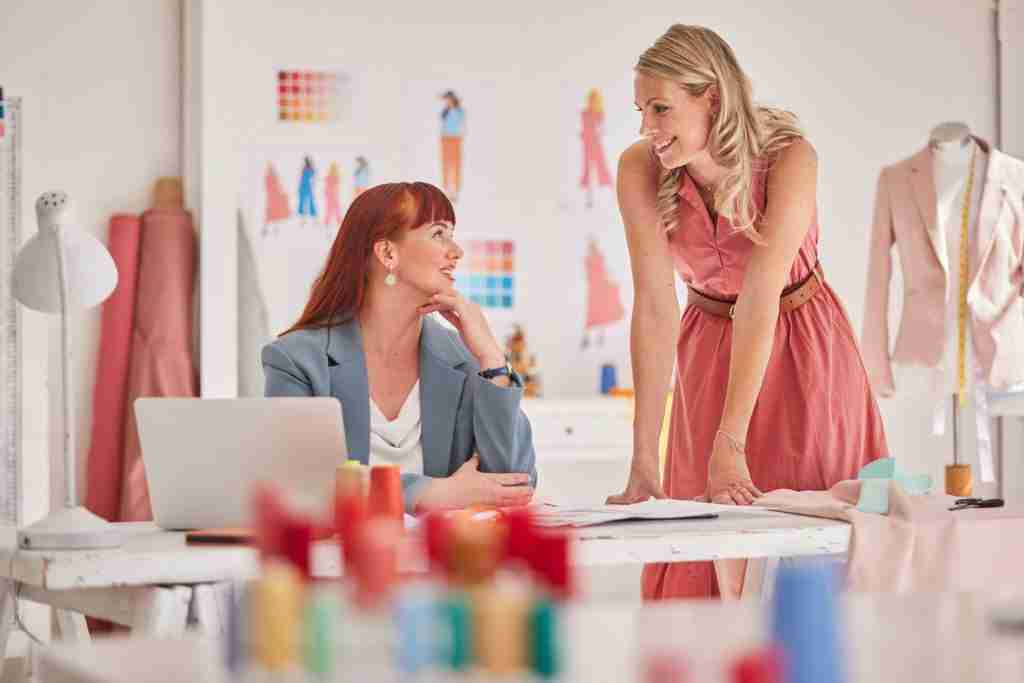 Fashion, design and laptop business women planning, teamwork and working on startup e commerce, ret