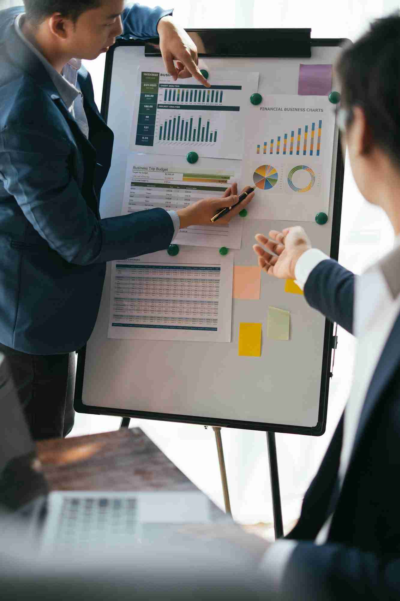 Young smart businessman leading the meeting by using his idea in the presentation.