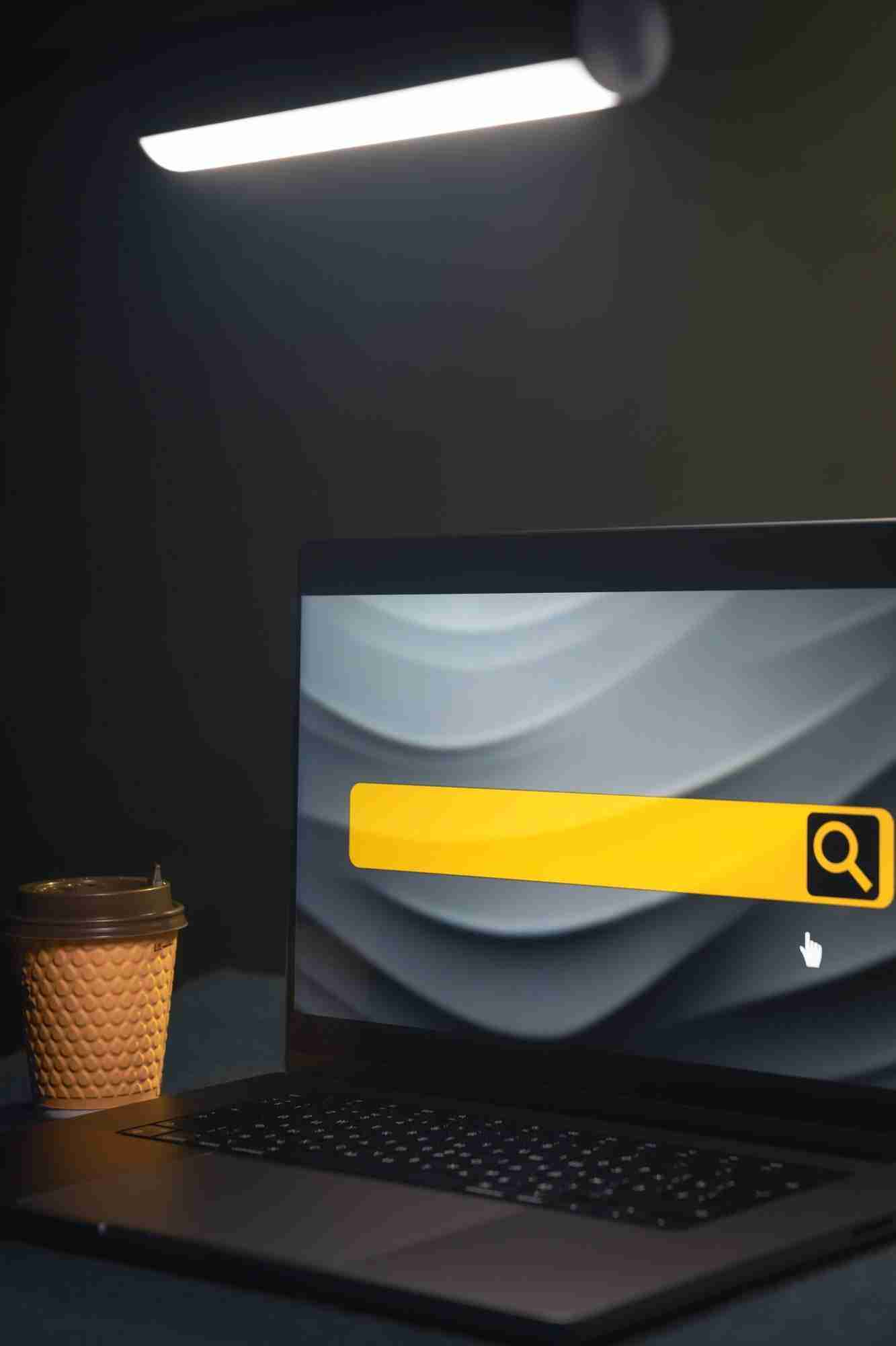 Laptop with internet browser search bar on screen.