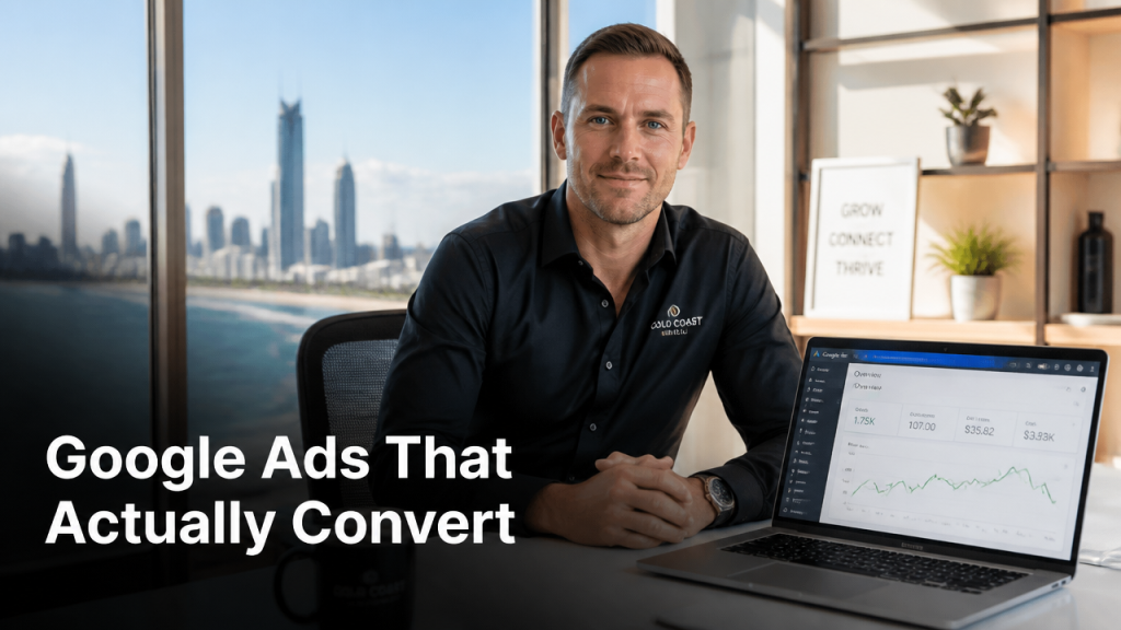 Gold Coast small business owner reviewing Google Ads campaign performance on a laptop in a modern coastal office