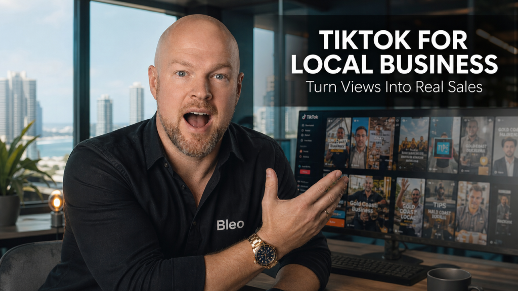 Luke Houlihan excited in a Gold Coast creative studio explaining TikTok marketing strategy for local small businesses