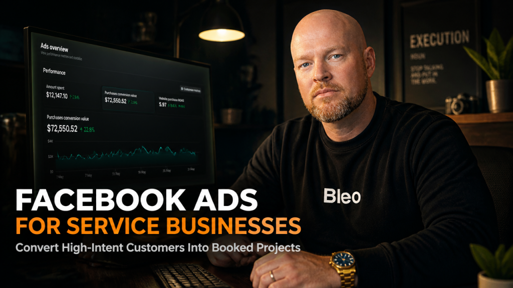 Luke Houlihan at a studio desk reviewing campaign analytics on a monitor, wearing Bleo branding, with confident expression analyzing Facebook Ads conversion data for service businesses