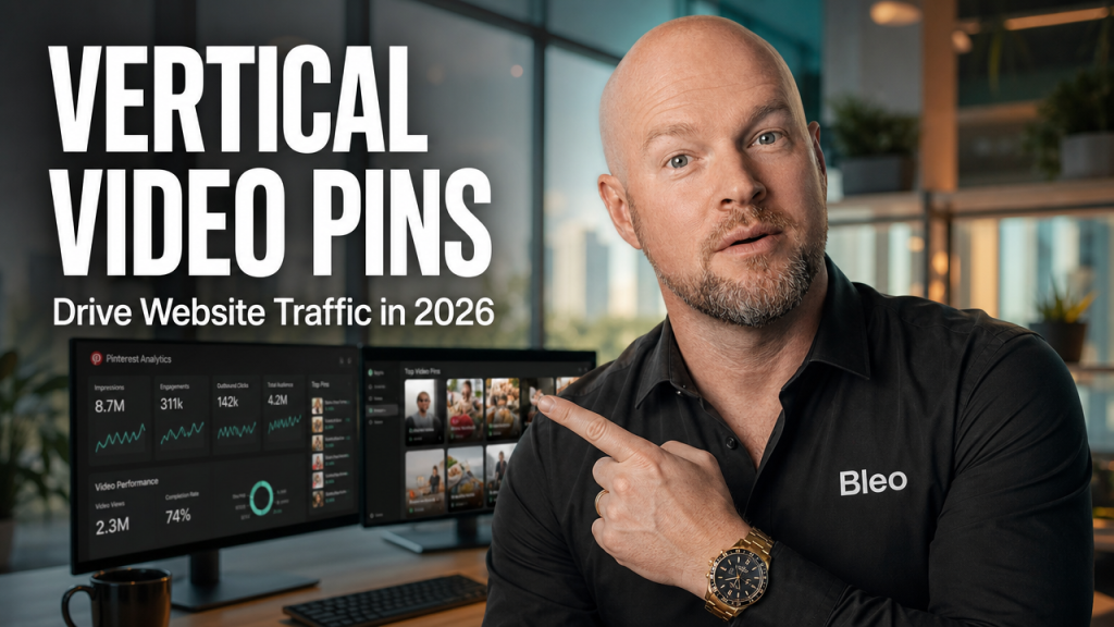 Luke Houlihan in a modern digital office wearing a Bleo-branded shirt, smiling confidently while standing near monitors showing Pinterest analytics. Text overlay reads "VERTICAL VIDEO PINS" and "Drive Website Traffic in 2026".