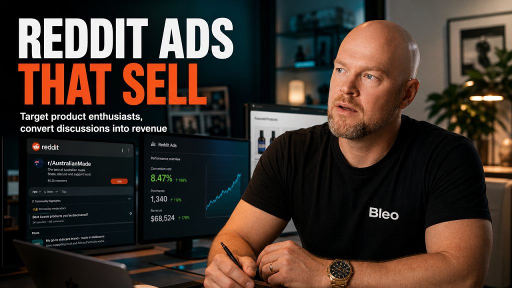 Luke Houlihan in a modern home office with Reddit analytics displayed on monitors, wearing a Bleo-branded shirt, with engaged expression and text overlay reading "Reddit Ads That Sell"