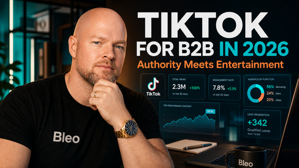 A professional B2B marketer at a modern workspace with holographic TikTok analytics displays, smiling confidently with text overlay reading 'TikTok for B2B in 2026 Authority Meets Entertainment'