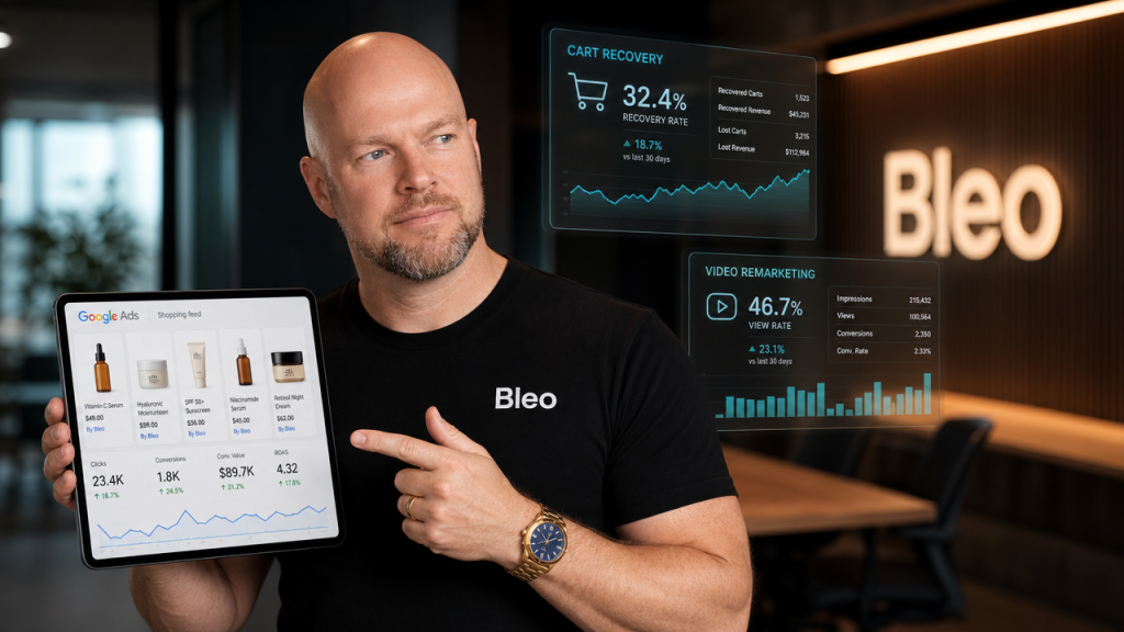Male strategist examining Google Ads Shopping feed and cart recovery analytics displayed on tablet and holographic UI panels in modern office setting